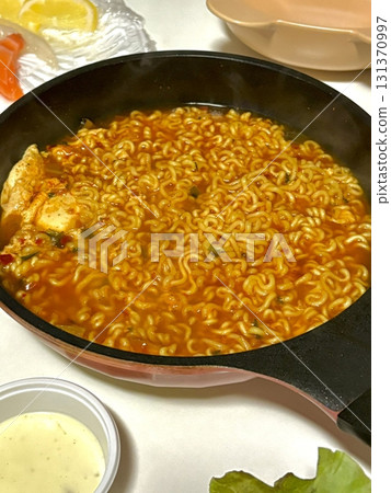 Shin Ramyun,close up of Ramyeon or Ramyun is a Korean-style soup noodle dish with a spicy flavor. Ramyeon or Korean instant noodles with egg - Korean food style 131370997
