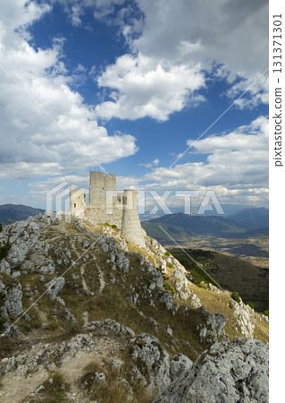 Rocca Calascio castle ruins overlooking Abruzzo valley Rocca Calascio castle ruins overlooking Abruzzo valley 131371301