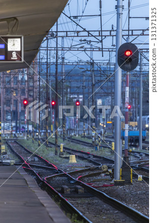 Train station tracks with red signals at Nadrazni 131371325