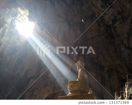 Light shining into the caves of the Marble Mountains in Da Nang Light shining into the caves of the Marble Mountains in Da Nang 131371369