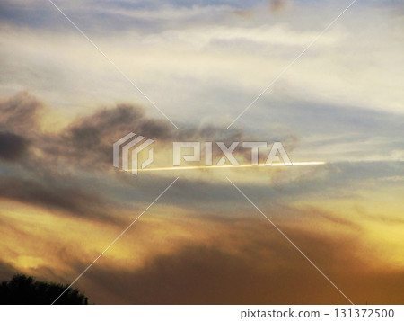 Landscape of sunset sky and contrails Landscape of sunset sky and contrails 131372500