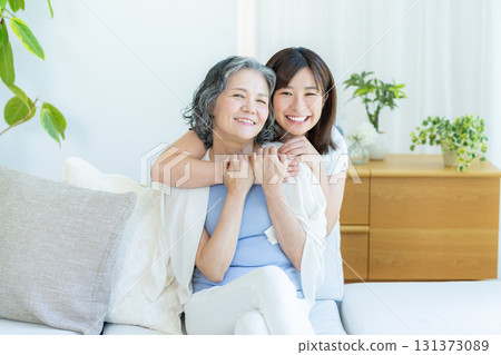 Good friends and parents relaxing in the living room Good friends and parents relaxing in the living room 131373089