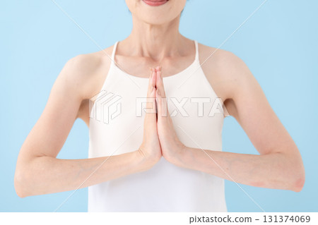 Woman doing yoga, hands Woman doing yoga, hands 131374069