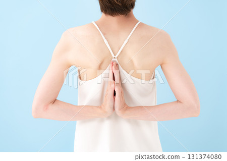 Woman doing yoga, hands 131374080