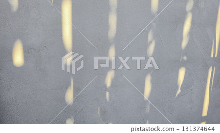 Old concrete wall, natural texture. Light background. Shadows from the fence. 131374644