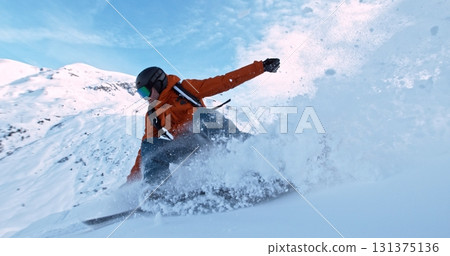 Real professional snowboarder rides at off-piste ski slope. Winter sports concept 131375136