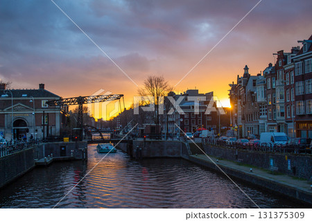 Sunset Over Canal in Amsterdam, Netherlands 131375309