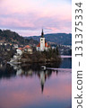 Church on Lake Bled with Pletna Boat at Sunset, Slovenia 131375334