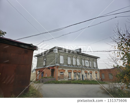 Charming Old Wood and Brick Building Facade 131375606