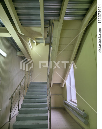 Industrial Staircase with Metal Railings, Interior View Industrial Staircase with Metal Railings, Interior View 131375624
