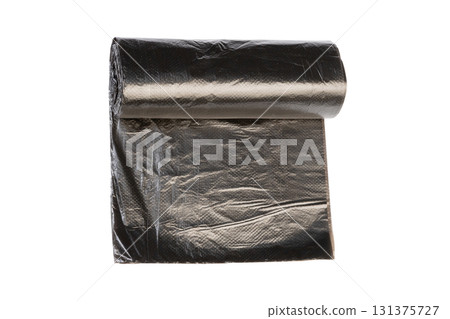 New black plastic garbage bags in roll for waste collection and storage isolated on white background 131375727