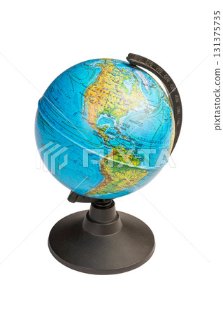Colorful small globe displays the continents of North and South America with in Russian inscriptions isolated on white background. Colorful small globe displays the continents of North and South America with in Russian inscriptions isolated on white background. 131375735