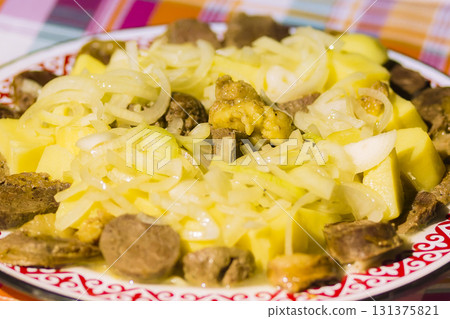 Traditional Kazakh dish "Bishbarmak" Traditional Kazakh dish "Bishbarmak" 131375821