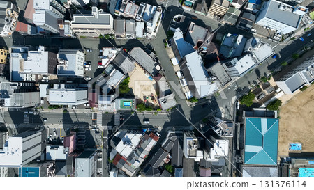 Aerial view of modern city and roads taken by drone Aerial view of modern city and roads taken by drone 131376114