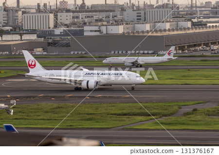 Haneda Airport at dusk, airplane landing, Ota Ward, Tokyo Haneda Airport at dusk, airplane landing, Ota Ward, Tokyo 131376167