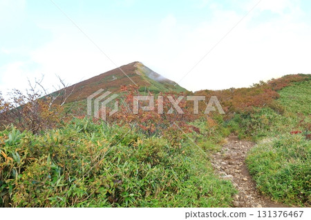 Niseko Annupuri, one of Japan's 300 famous mountains, viewed from the hiking trail in autumn Niseko Annupuri, one of Japan's 300 famous mountains, viewed from the hiking trail in autumn 131376467