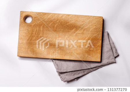Empty cutting board on a white background with leaf shadows 131377270