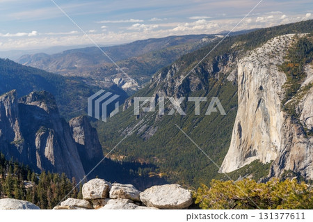 Scenic summer landscape in Yosemite National Park with mountains, forest, and sky 131377611