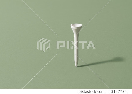 Close-up of white golf tee on green background, showcasing simplicity and design of golf accessory, copy space. 131377853