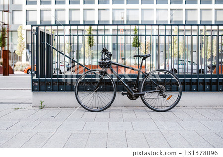 Bicycle parked on street in city. 131378096