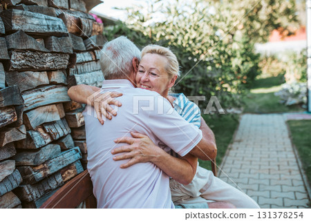 Happy senior couple embracing, spending time together during retirement. Happy senior couple embracing, spending time together during retirement. 131378254