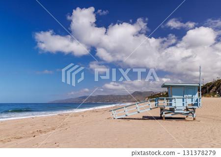 Lifeguard tower on a California ocean beach with golden sand and waves Lifeguard tower on a California ocean beach with golden sand and waves 131378279