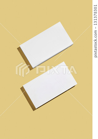 Two white rectangular podium or boxes with shadow on bright yellow background. 131378301