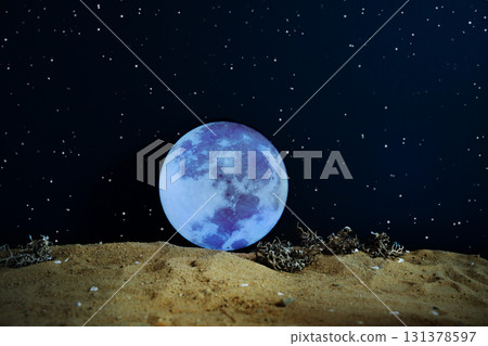 Majestic giant Moon rising above alien planet surface under sparkling starry sky, symbol of cosmic and interplanetary exploration. Night scene of glowing Moon seen from distant planet surface. Majestic giant Moon rising above alien planet surface under sparkling starry sky, symbol of cosmic and interplanetary exploration. Night scene of glowing Moon seen from distant planet surface. 131378597