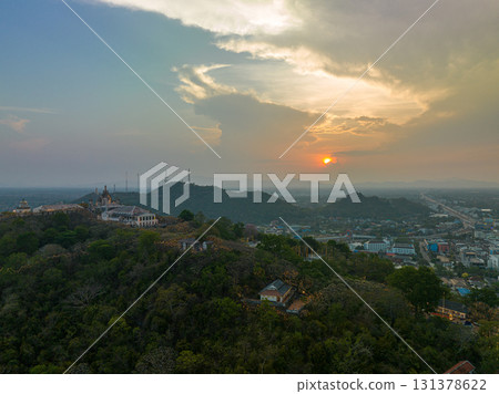aerial view beautiful sunset above the palace in Phetchaburi city on hilltop. aerial view beautiful sunset above the palace in Phetchaburi city on hilltop. 131378622