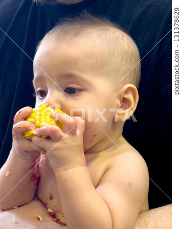 Baby Enjoying Corn on the Cob Baby Enjoying Corn on the Cob 131378629