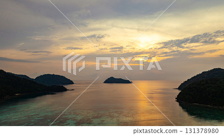 aerial view of stunning sunset above Ko Pachumba Surin Islands 131378980