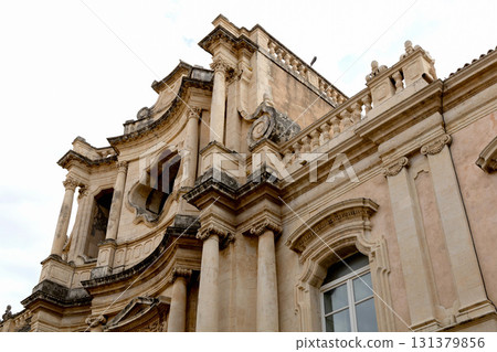 Classic italian architecture with shuttered windows exterior 131379856