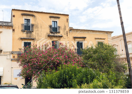 Classic italian architecture with shuttered windows exterior 131379859