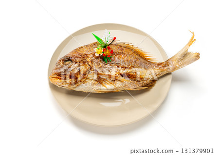 Celebratory grilled whole sea bream and decorations 131379901