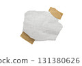 Torn piece of school notebook in a cage with beige tape isolated on white background 131380626