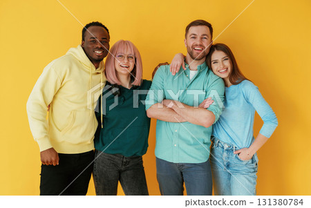 Front view. Group of friends are in the studio against background 131380784