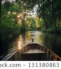 Wooden boat gliding through tranquil river, golden sunset illuminating verdant shoreline with warm, reflective landscape and peaceful ambiance 131380863