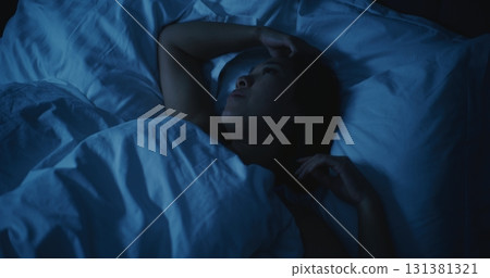 Young Tired Woman With Anxious Thoughts Cannot Sleep at Night Young Tired Woman With Anxious Thoughts Cannot Sleep at Night 131381321
