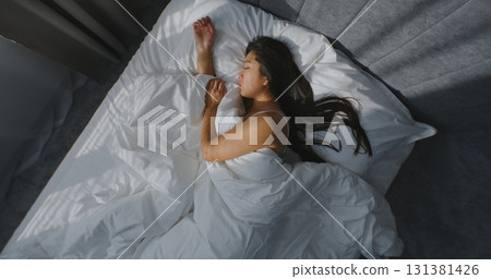 In Morning, Young Girl Sleeps in Cozy Bed in Stylish Bedroom In Morning, Young Girl Sleeps in Cozy Bed in Stylish Bedroom 131381426