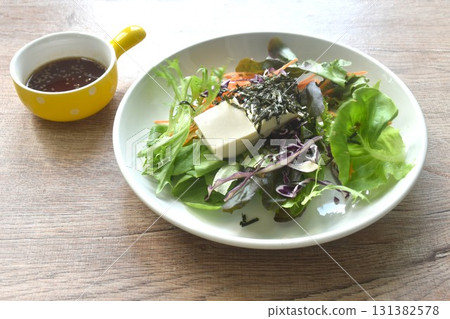 white soft tofu with vegetable dressing Japanese roasted sesame sauce salad on plate 131382578