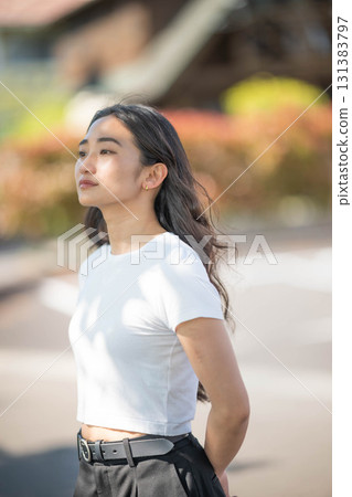 Woman relaxing by the river 131383797