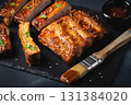 Barbecue pork spare ribs with hot honey chili marinade on black background 131384020