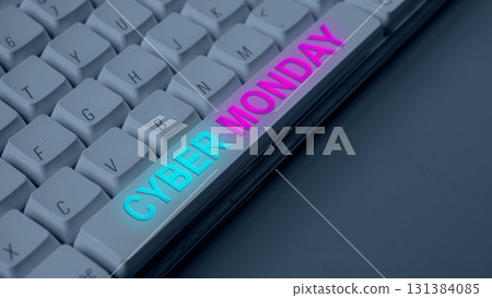 Closeup view of bright lit text of Cyber Monday on the computer keyboard button. Copy space. Cyber Monday sale concept 131384085