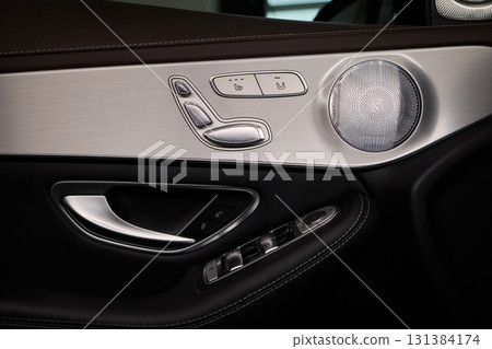 Modern Car Door Control Panel with Window Switches for convenience and functionality Modern Car Door Control Panel with Window Switches for convenience and functionality 131384174
