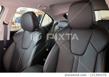 Discover the Stylish Car Interior with Premium Leather Seats for elegance and comfort 131384178