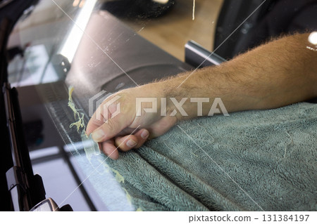 Witness the entire Window Tinting Process in Action Craftsmanship that enhances your vehicle Witness the entire Window Tinting Process in Action Craftsmanship that enhances your vehicle 131384197