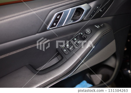 Modern Car Door Control Panel with Window Switches for convenience and functionality Modern Car Door Control Panel with Window Switches for convenience and functionality 131384263