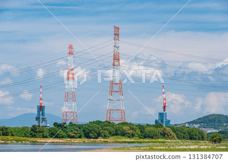 Power line tower standing on the banks of the Yodo River, Takatsuki City, Osaka Prefecture 131384707