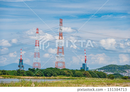 Power line tower standing on the banks of the Yodo River, Takatsuki City, Osaka Prefecture 131384713