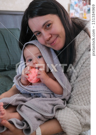 Mother and Baby Bonding with Glowing Toy Mother and Baby Bonding with Glowing Toy 131384969
